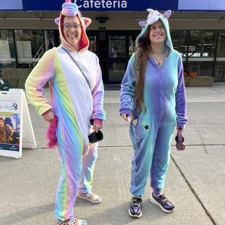 two people dressed as unicorns for Halloween