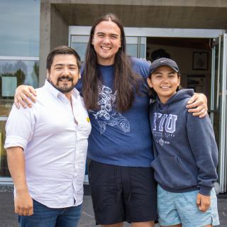 From left to right: Hayden Kenneth Taylor, Sheldon Scow and Talela Manson are hard at work planning a fun-filled summer camp experience for students. 