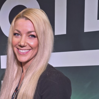 Caitlin Hartigan smiling at the camera