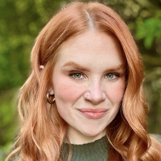 Whitney Williams smiling at the camera