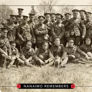 A group of soldiers poses for a photo