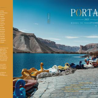 Portal cover. A list of contributor names runs along the left side and several multi-coloured swan boats line the shore of a lake with a mountain range in the background.