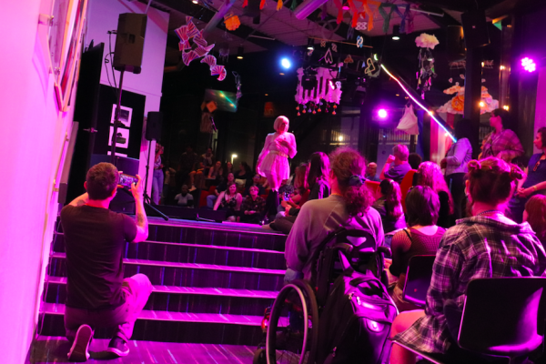 A performer on the stage during Drag in the Theatre.