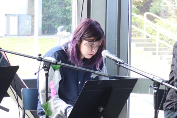 Ceridwen Nord does a dramatic reading during VIU's International Women's Day event.