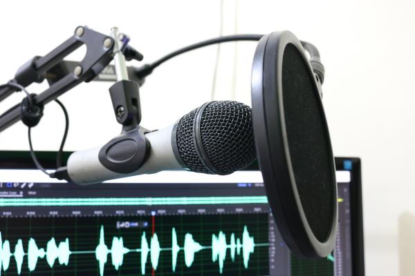 A black podcast microphone.