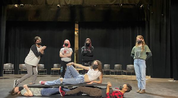 Six VIU students practice a scene onstage at Malaspina Theatre.