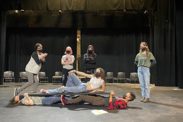 Six VIU students practice a scene onstage at Malaspina Theatre.