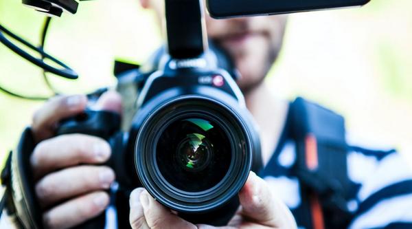 man holding camera