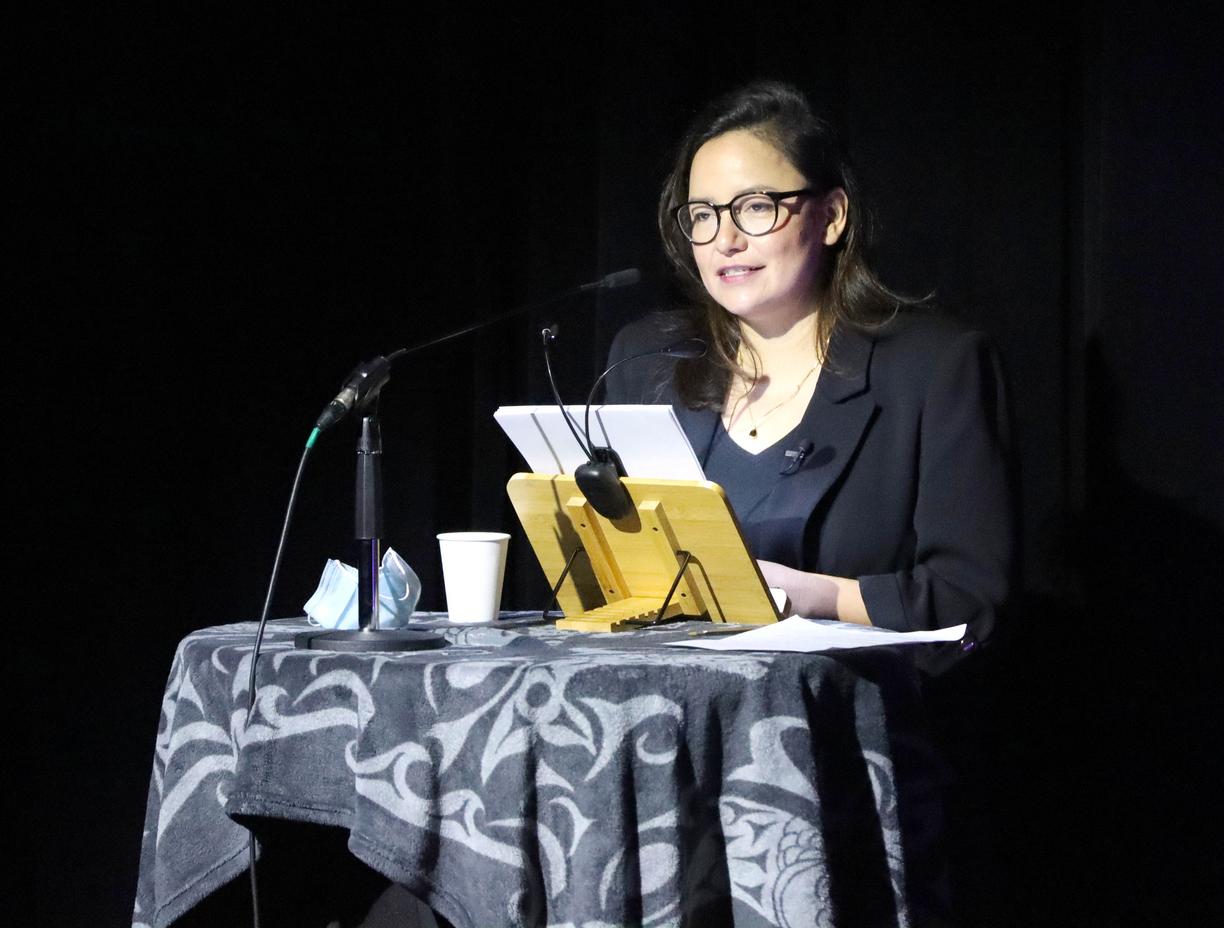 Indigenous Speakers Series keynote Connie Walker speaks at a podium in the Malaspina Theatre