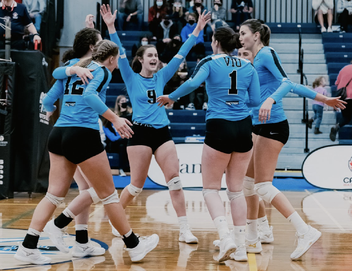 VIU Mariners women's volleyball team celebrating