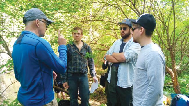 Geography Professor Alan Gilchrist and students