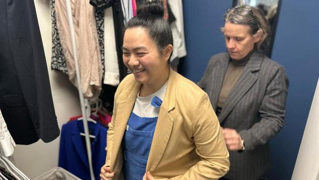 career closet trying on clothes