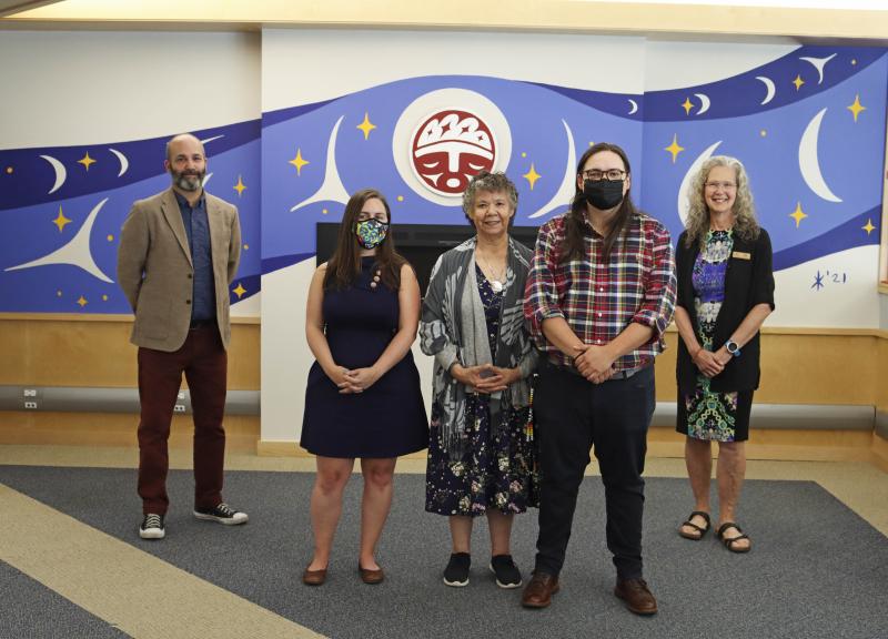 The unveiling of a new mural in the library commons area